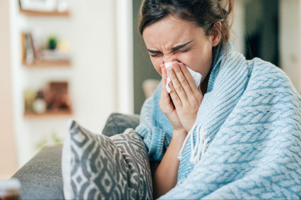 Woman in need of a Sinus Headache Treatment in Englewood