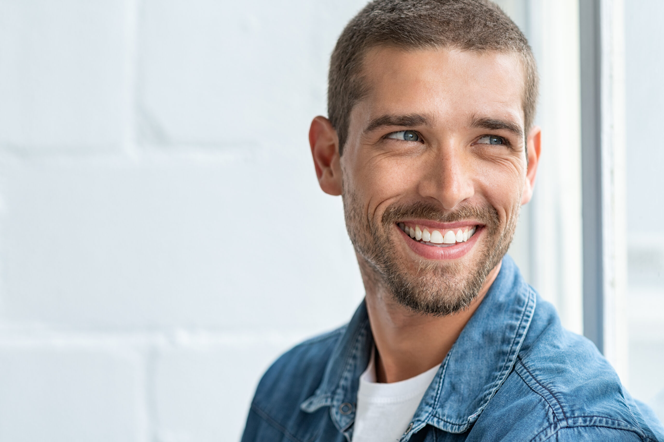 Man-Indoors-1158245623-scaled